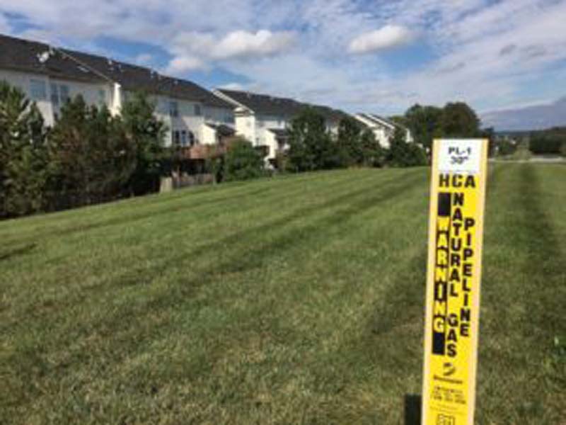 A stake marks a natural gas pipeline in Leesburg, Virginia.