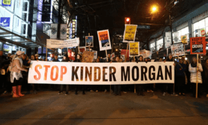 ‘Not on our watch’: protesters in British Columbia march in opposition to Canada’s decision to approve Kinder Morgan pipeline in the Alberta oil sands. Photograph: Ben Nelms/Reuters
