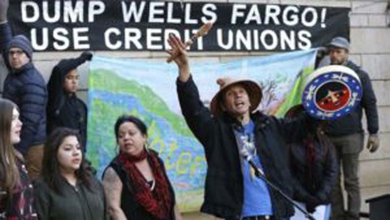 Dakota Access Pipeline protest movement now focuses on the money